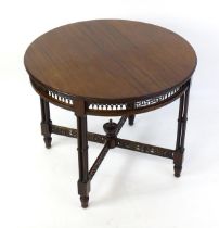 A late 19thC mahogany centre table, with a circular top above a pierced frieze and stretchers in the