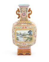 A Chinese famille rose vase of squared form with stylised twin handles, with panelled decoration