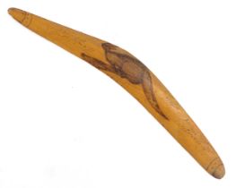 An Australian Aboriginal mangrove timber souvenir boomerang titled Greetings from Australia with