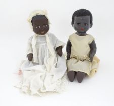 Toys: Two 20thC plastic black dolls, to include an example by Pedigree with blinking eyes, painted