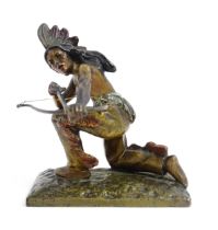 An Austrian cold painted bronze modelled as a Native American Indian with a bow and arrow. Approx. 3