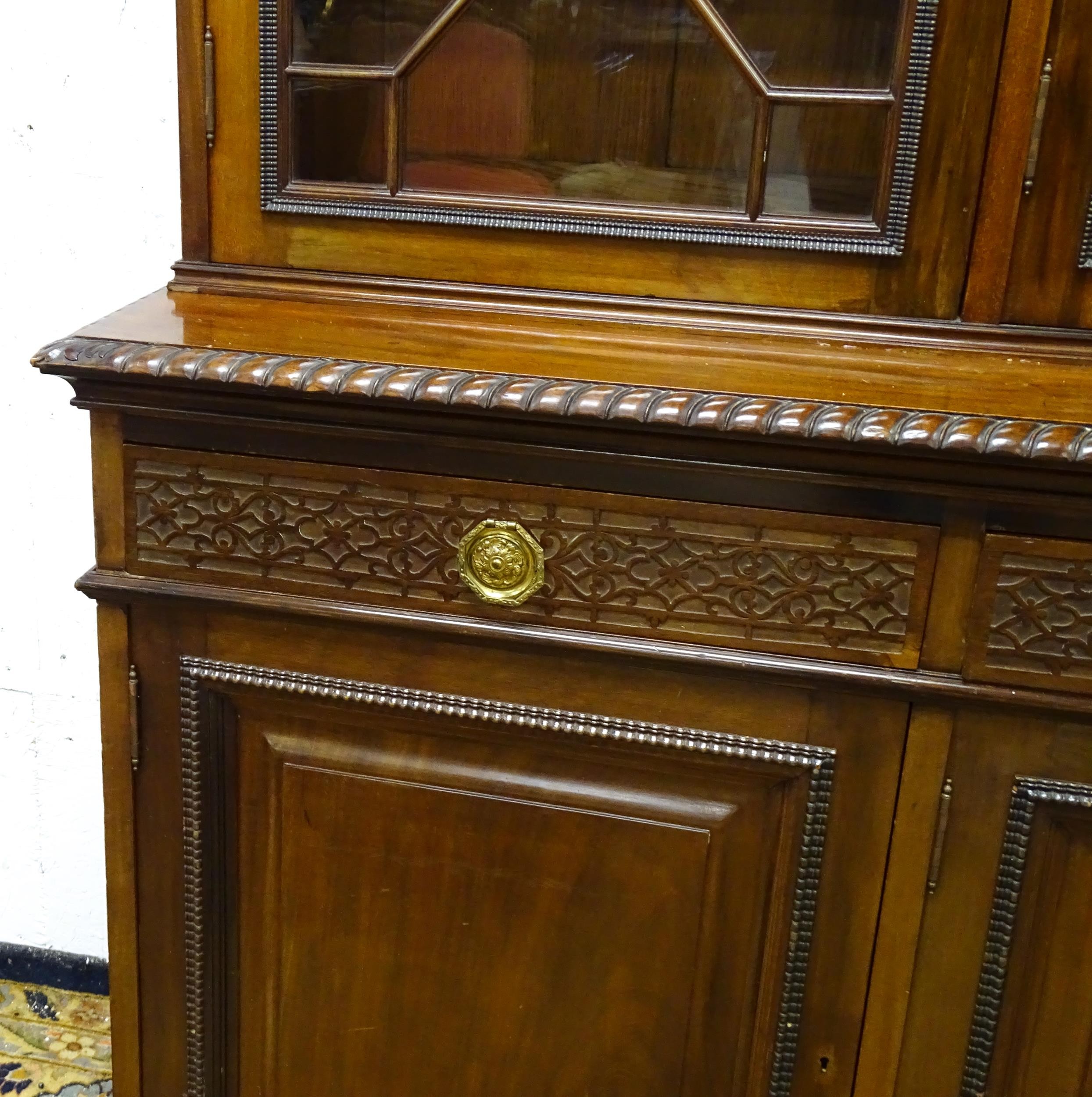 A late 19thC mahogany glazed bookcase by S & H Jewell, Queen Street, London. The cornice with - Image 6 of 9