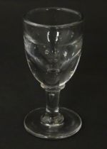 A toast master's glass. Approx. 4" high Please Note - we do not make reference to the condition of