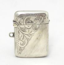 A silver vesta case with engraved decoration hallmarked Birmingham 1916, maker Jones & Crompton.