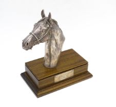 A filled silver horse head trophy, hallmarked Sheffield 1999, maker Camelot Silverware Ltd. on a