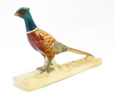 A Beswick model of a pheasant model no. 1774. Marked under. Approx. 8 1/2" long Please Note - we