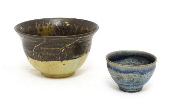 A studio pottery two tone bowl with drip detail. Together with a small studio pottery bowl with a