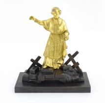 A late 19th / early 20thC Continental bronze sculpture depicting an ormolu Cardinal figure on a