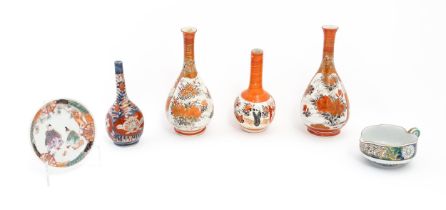 A quantity of Oriental items to include Japanese Kutani bottle vases, an Imari vase, a small milk