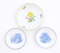 A Continental dessert plate with hand painted flower detail, marked under with Meissen style crossed