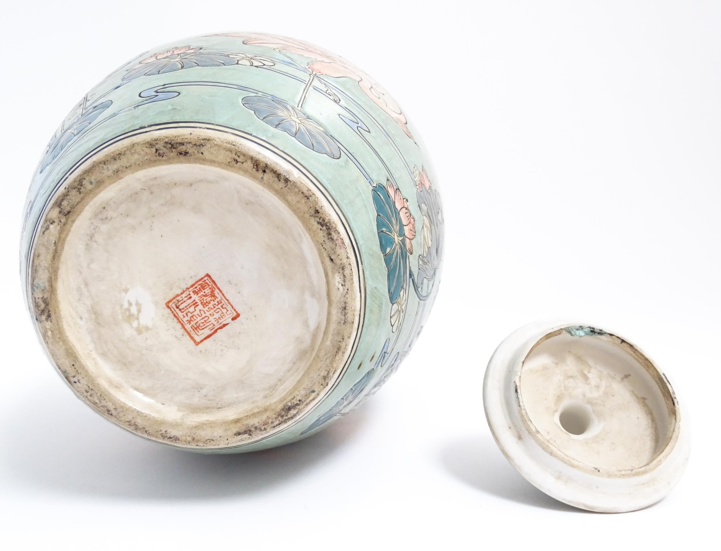 A Chinese ginger jar with celadon style glaze decorated with crane birds, flowers, lily pads, etc. - Image 8 of 8