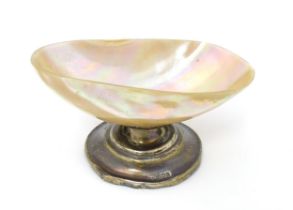 A silver pedestal table salt with mother of pearl shell formed bowl Hallmarked Birmingham 1907 maker