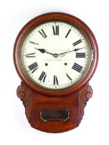 A mahogany cased 8-day drop dial wall clock. The 11" diameter dial signed, C J Martin. Approx. 21"