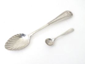 A silver teaspoon with shell formed bowl hallmarked Sheffield 1909,Together with a silver plate salt