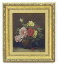 N. Partington, 20th century, Oil on canvas, A still life study of roses in a vase. Signed and