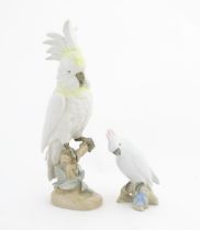 Two Royal Dux models of birds, comprising a large Cockatoo bird with yellow and white feathers