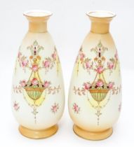 A pair of Crown Devon vases in the Etna pattern. Marked under. Approx. 9 1/2" high (2) Please Note -