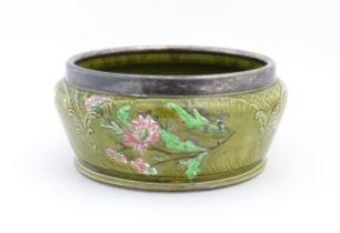 A German Imperial Bonn shallow planter with silver plate rim, the body with floral decoration.