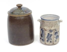 A West German Rumtopfs pot marked 827-31. Together with a studio pottery lidded bread crock. Largest