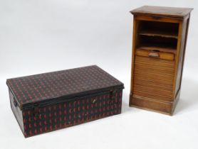 A painted tin trunk together with a tambour fronted cabinet. The trunk measuring 29" wide x 24" deep