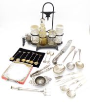 A quantity of assorted silver plate etc to include a cruet stand, strainer, pistol grip handled