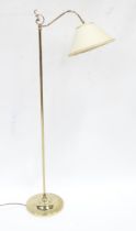 A late 20thC brass standard lamp with white shade, approx 55" high Please Note - we do not make