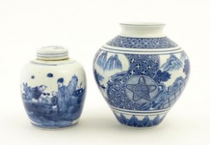 A Chinese blue and white ginger jar and cover decorated with figures in a landscape. Together with