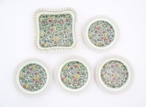 Five items of Royal Doulton decorated in the Persian pattern D3550 comprising four plates and a