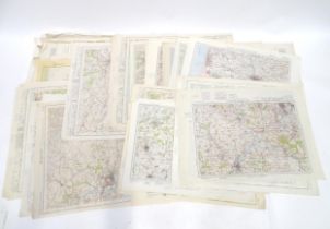 A large quantity of mid-20thC 1" : 1 mile Ordnance Survey maps of British locations, including the