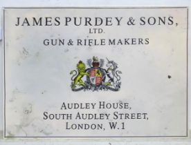 A reproduction advertising sign for James Purdey & Sons Gunmakers, approx 27 1/2" x 19 3/4" Please