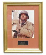 A framed photograph of Tom Hanks from the movie Saving Private Ryan. Photograph approx. 9" 7 1/2"