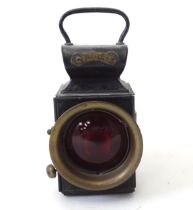 An early 20thC vehicle / signal lamp by Miller & Co of Birmingham. The brass case with blacked