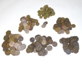 Coins: A quantity of assorted 19th / 20thC coins to include one penny and half penny coins,