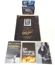 A quantity of James Bond 007 collectables, comprising a 50 year commemorative Diamonds Are Forever