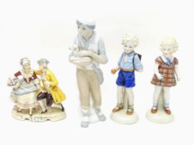 Four assorted Continental figures to include a Casades model of a boy holding an animal, a figural