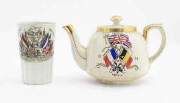 Two ceramic commemorative items comprising a Booths WWI Peace celebration cup 1914-1919, and a WWI