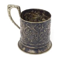 A Continental white metal tisane beaker holder . With floral and foliate detail. Indistinctly marked