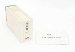 An APC CS500 battery back up and surge protector, with instruction booklet. Approx 11" long Please