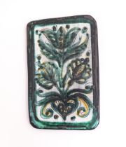A studio pottery tile by Burkart Handarbeit, with floral and foliate detail. Signed to reverse.