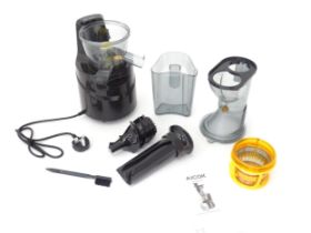 An Aicok slow juicer kit, with motor unit, jugs, separator basket and operating instructions etc.