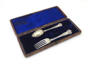 A silver plate Kings pattern Christening fork and spoon in an associated case, the largest approx