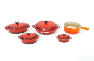 Assorted cookware / oven dishes, etc. to include an example by Le Creuset. Largest approx 12" in