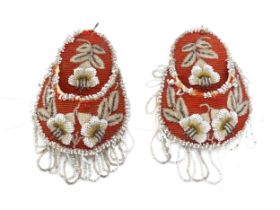Two beadwork pockets with floral detail. Approx. 6 1/2" long (2) Please Note - we do not make