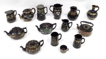 A quantity of assorted Victorian Jackfield style ceramics to include teapots, hot water pots,