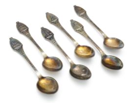 6 Danish silver plate souvenir spoons. Titles Kobenhavn / Copenhagen, the handles decorated with