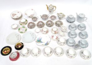 A quantity of assorted tea / coffee wares to include cups and saucers, trios, cake / sandwich
