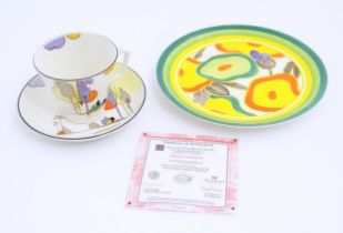 An Art Deco Tams Ware cup and saucer decorated in the Woodland pattern. Together with a limited