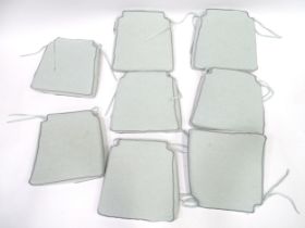 8 garden furniture tie cushions, the covers with zips and removable foam inserts, each approx 17"