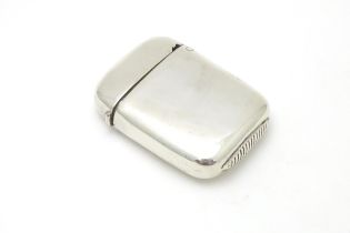 A silver plate vesta case with striker under and hinged lid. Approx. 2" high Please Note - we do not