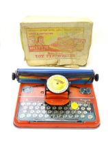 Toy: A Mettoy Junior tinplate toy typewriter with original box. Please Note - we do not make